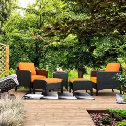 Crafttown 5-Piece Black Rattan Outdoor Patio Furniture Set with Waterproof Orange Cushions, Powder-Coated Iron Frame, Glass Coffee Table & Ottomans for Patios, Gardens & Lounging