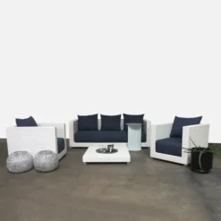 Premium Designer White Rattan 4-Piece Outdoor Sectional Sofa Set | Luxury Balcony, Poolside & Courtyard Seating with Navy Blue Cushions and Coffee Table