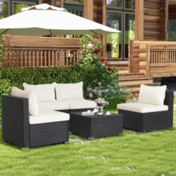 Luxury 4-Piece Black Wicker Sofa Set with White Cushions – All-Weather, Stylish Outdoor Furniture