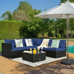 Premium Designer Black Rattan 4-Piece Sectional Outdoor Sofa Set | Luxury Poolside, Backyard, Garden & Patio Seating with Navy Blue Cushions and Glass Coffee Table
