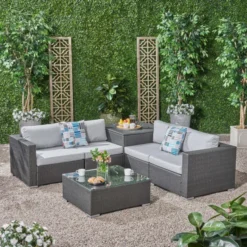 Durable Dark Brown Outdoor Sectional Set with Grey Cushions & Stylish Glass Coffee Table